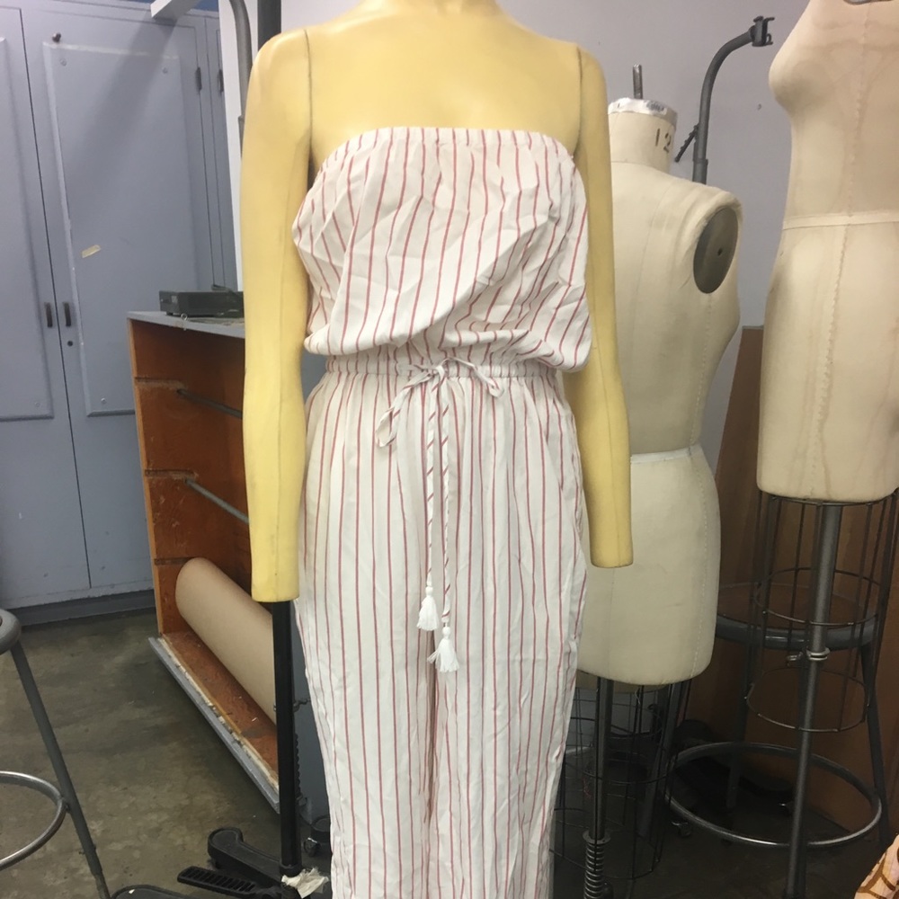 Peach and cream romper in size M/L.